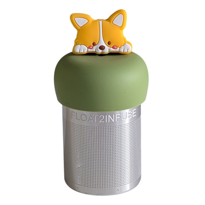 orange and white corgi dog face tea infuser for loose leaf tea with fine mesh stainless steel tea strainer that reads FLOAT2INFUSE on a green base with a white background