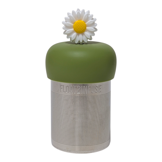 White sunflower tea infuser with a green base for loose leaf tea with a fine mesh stainless steel tea strainer that reads FLOAT2INFUSE with a white background