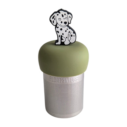 White dalmatian with black spots tea infuser  for loose leaf tea with a fine mesh stainless steel tea strainer that reads FLOAT2INFUSE on a green base with a white background
