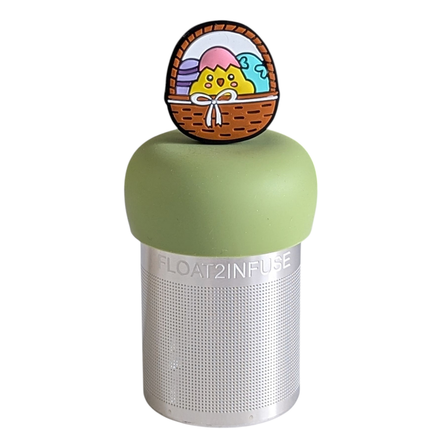 brown easter basket with baby chick and easter eggs tea infuser for loose leaf tea with a fine mesh stainless steel tea strainer that reads FLOAT2INFUSE on a green base with a white background