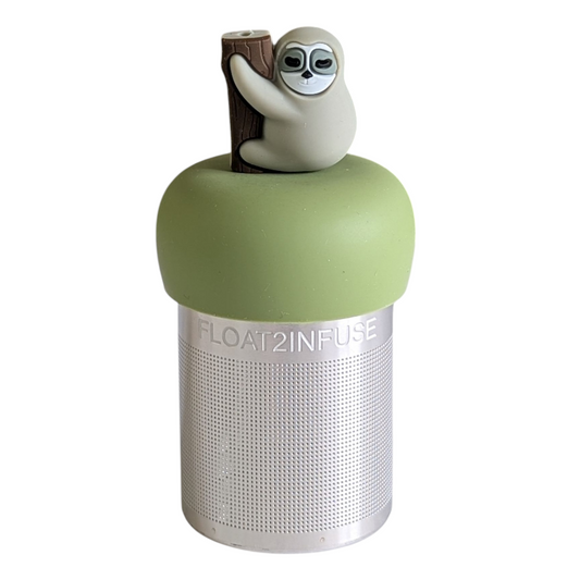 grey sloth animal climbing a tree tea infuser for loose leaf tea with a fine mesh stainless steel tea strainer that reads FLOAT2INFUSE on a green base with a white background