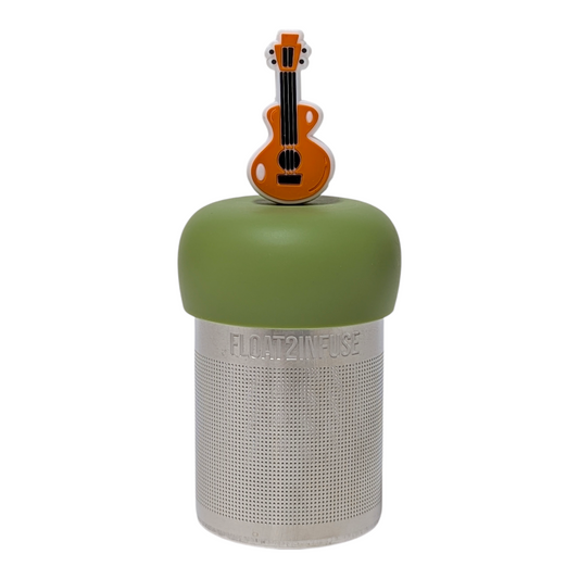 Brown guitar tea infuser  for loose leaf tea with a fine mesh stainless steel tea strainer that reads FLOAT2INFUSE on a green base with a white background