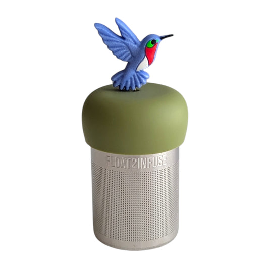 Beautiful blue hummingbird tea infuser for loose leaf tea with a fine mesh stainless steel tea strainer 
that reads FLOAT2INFUSE on a green base with a white background