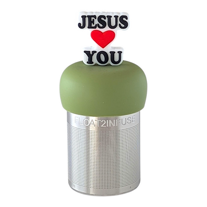 text that reads "Jesus loves you" with a heart instead of the word love tea infuser for loose leaf tea with fine mesh stainless steel tea strainer that reads FLOAT2INFUSE on a green base with a white background