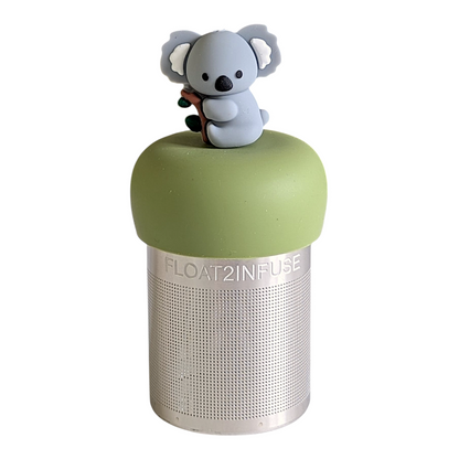 grey koala animal on a tree branch tea infuser for loose leaf tea with a fine mesh stainless steel tea strainer that reads FLOAT2INFUSE on a green base with a white background