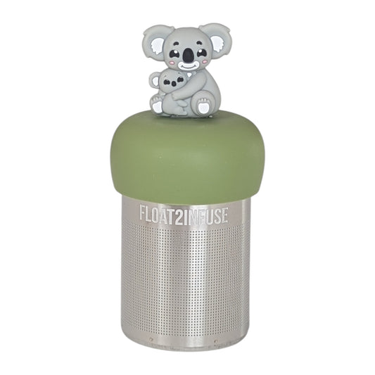Gray koala mom holding baby koala tea infuser for loose leaf tea with a fine mesh stainless steel tea strainer that reads FLOAT2INFUSE on a green base with a white background