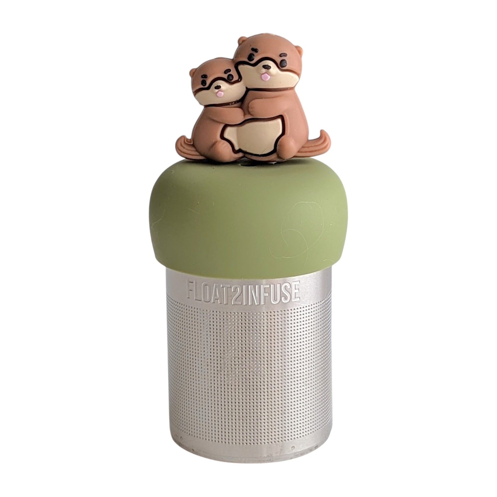 Brown otter momma hugging her baby tea infuser for loose leaf tea with a fine mesh stainless steel tea strainer that reads FLOAT2INFUSE on a green base with a white background