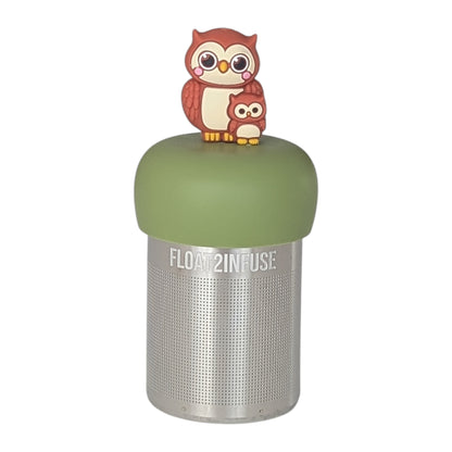 Brown owl mom holding baby owl tea infuser  for loose leaf tea with a fine mesh stainless steel tea strainer that reads FLOAT2INFUSE on a green base with a white background