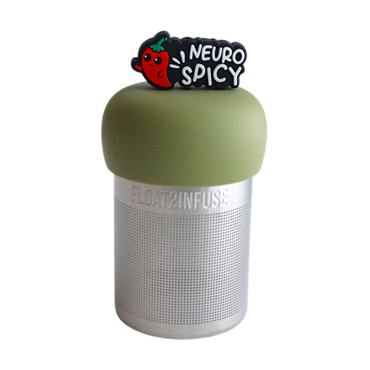 black rectangle with text "neuro spicy" and a smiling red pepper tea infuser for loose leaf tea with a fine mesh stainless steel tea strainer that reads FLOAT2INFUSE on a green base with a white background