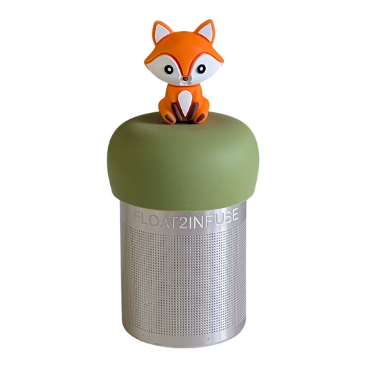 orange fox animal tea infuser for loose leaf tea with a fine mesh stainless steel tea strainer that reads FLOAT2INFUSE on a green base with a white background