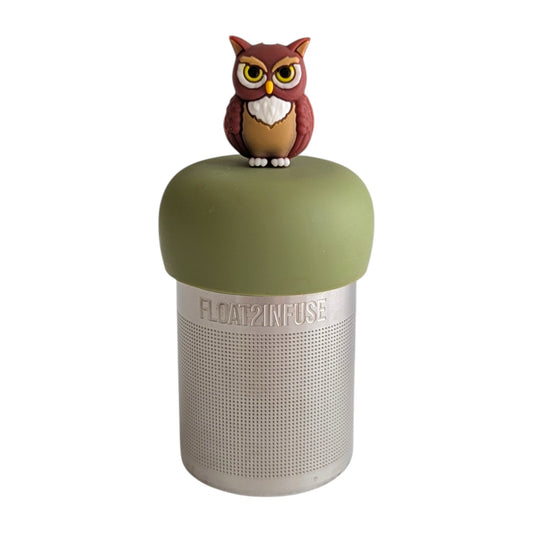 Brown owl tea infuser for loose leaf tea with a fine mesh stainless steel tea strainer 
that reads FLOAT2INFUSE on a green base with a white background
