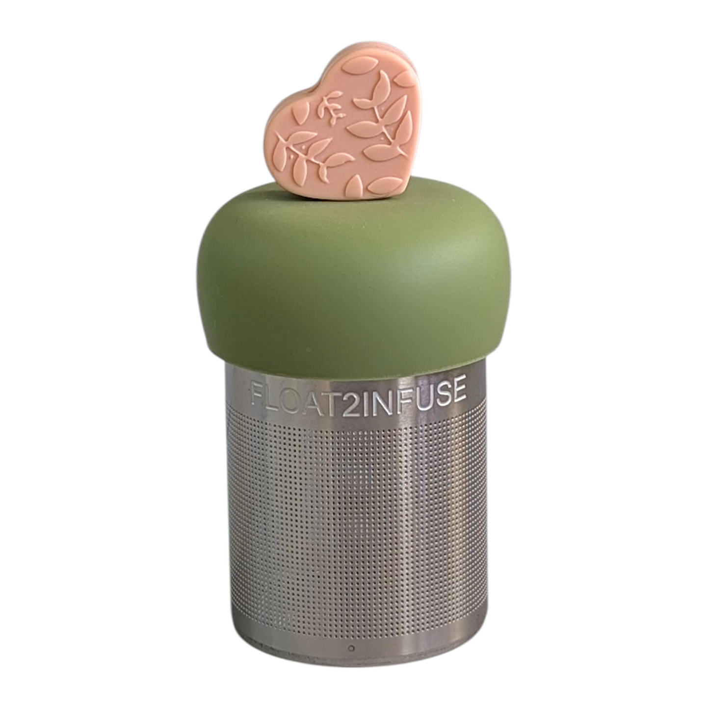 peach colored heart with leafy pattern tea infuser  for loose leaf tea with fine mesh stainless steel tea strainer that reads FLOAT2INFUSE on a green base with a white background