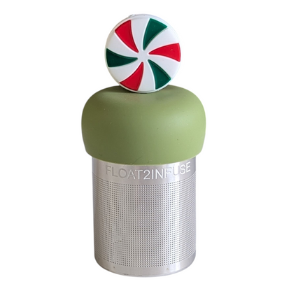 red, white, and green striped peppermint candy tea infuser for loose leaf tea with a fine mesh stainless steel tea strainer 
that reads FLOAT2INFUSE on a green base with a white background