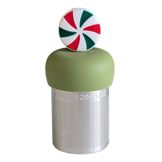 red, white, and green striped peppermint candy tea infuser for loose leaf tea with a fine mesh stainless steel tea strainer 
that reads FLOAT2INFUSE on a green base with a white background