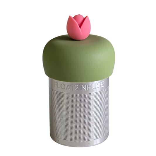pink tulip flower tea infuser for loose leaf tea with a fine mesh stainless steel tea strainer that reads FLOAT2INFUSE on a green base with a white background