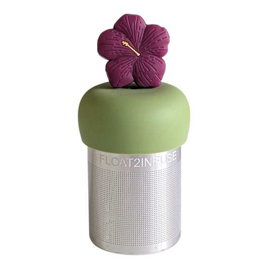 dark purple hibiscus flower tea infuser for loose leaf tea with a fine mesh stainless steel tea strainer that reads FLOAT2INFUSE on a green base with a white background