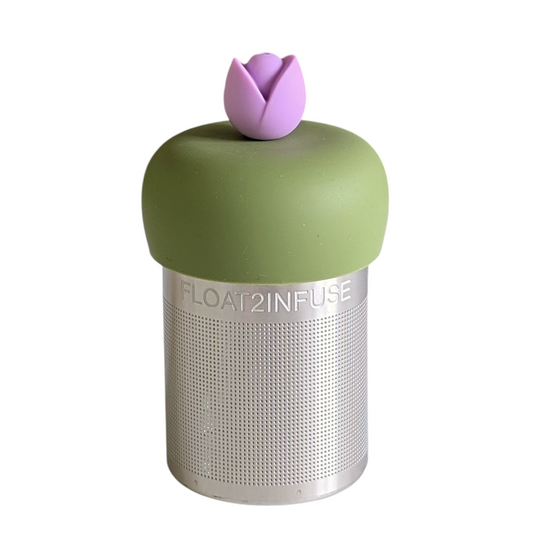 purple tulip flower tea infuser for loose leaf tea with a fine mesh stainless steel tea strainer that reads FLOAT2INFUSE on a green base with a white background