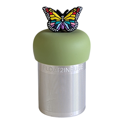 rainbow butterfly animal tea infuser for loose leaf tea with a fine mesh stainless steel tea strainer that reads FLOAT2INFUSE on a green base with a white background