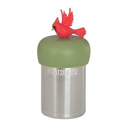 Red cardinal bird tea infuser for loose leaf tea with a fine mesh stainless steel tea strainer that reads FLOAT2INFUSE on a green base with a white background