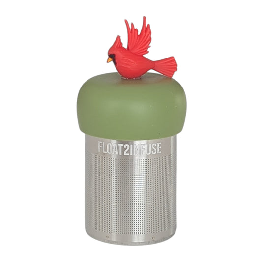 Red cardinal bird tea infuser for loose leaf tea with a fine mesh stainless steel tea strainer that reads FLOAT2INFUSE on a green base with a white background