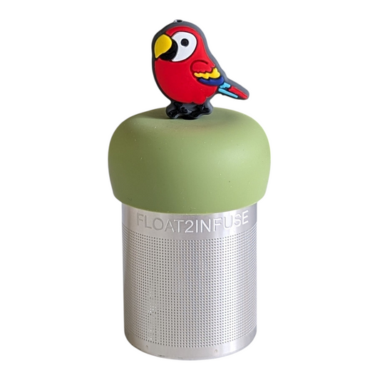 red parrot animal tea infuser for loose leaf tea with a fine mesh stainless steel tea strainer that reads FLOAT2INFUSE on a green base with a white background