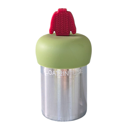 red knit sweater for loose leaf tea with fine mesh stainless steel tea strainer that reads FLOAT2INFUSE on a green base with white background