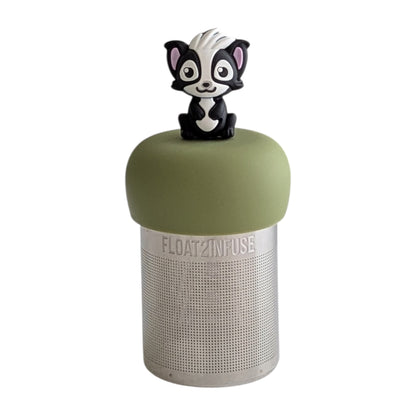 Skunk animal tea infuser for loose leaf tea on a green base with a fine mesh stainless steel tea strainer that reads FLOAT2INFUSE with a white background