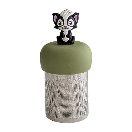 Skunk animal tea infuser for loose leaf tea on a green base with a fine mesh stainless steel tea strainer that reads FLOAT2INFUSE with a white background