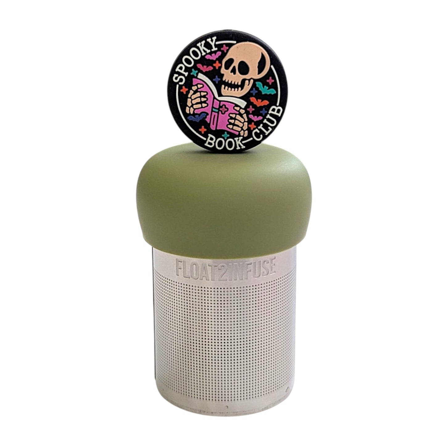 Black circle with an ivory skeleton reading a pink book with the text "spooky book club" and multicolored bats circling it tea infuser for loose leaf tea with a fine mesh stainless steel tea strainer that reads FLOAT2INFUSE on a green base with a white background