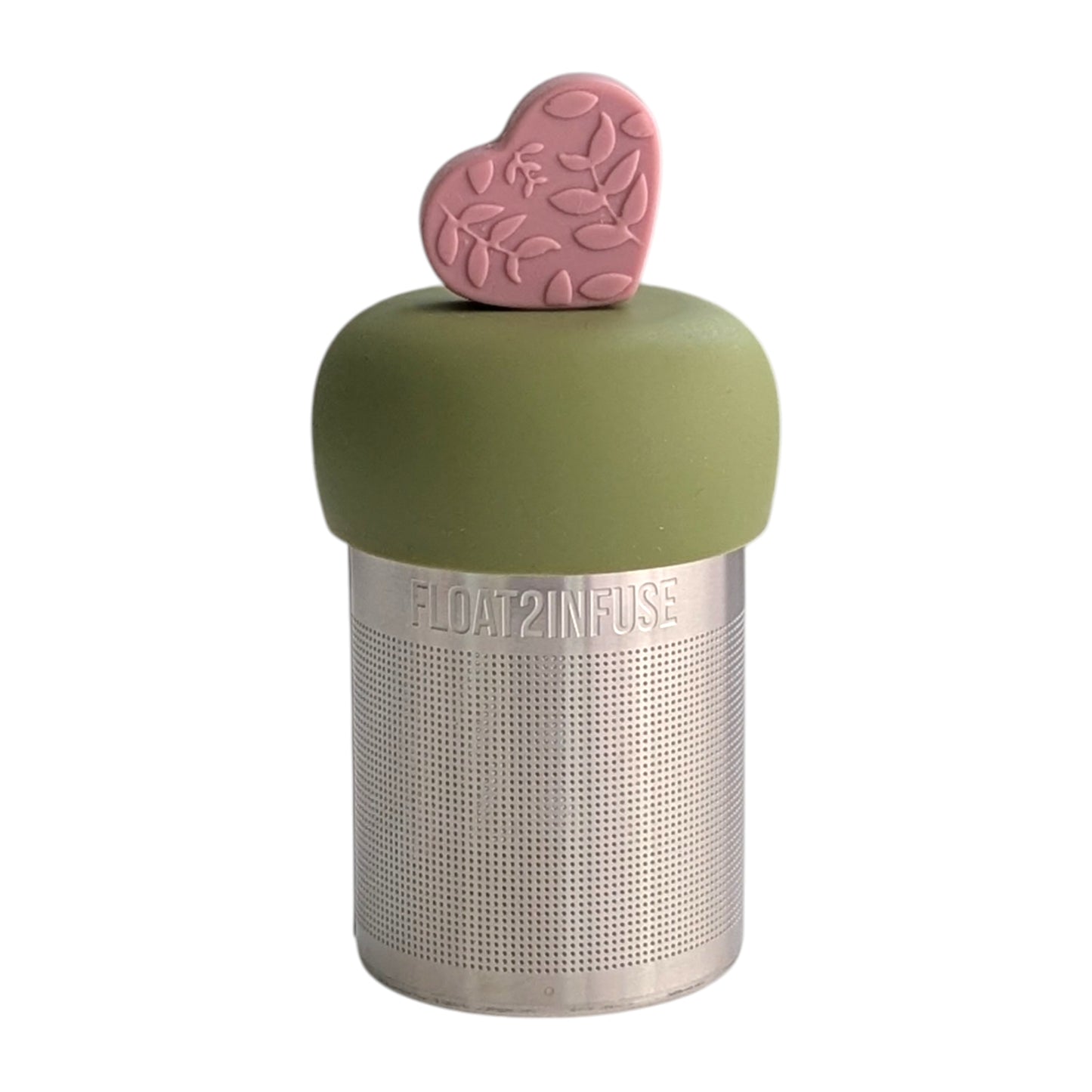 warm pink heart with raised floral pattern tea infuser for loose leaf tea with a fine mesh stainless steel tea strainer that reads FLOAT2INFUSE on a green base with a white background