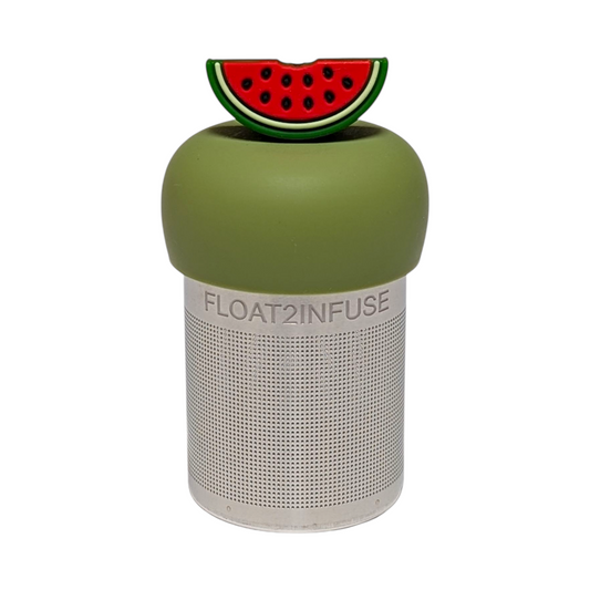 watermelon slice tea infuser for loose leaf tea with a fine mesh stainless steel tea strainer  that reads FLOAT2INFUSE on a green base with a white background