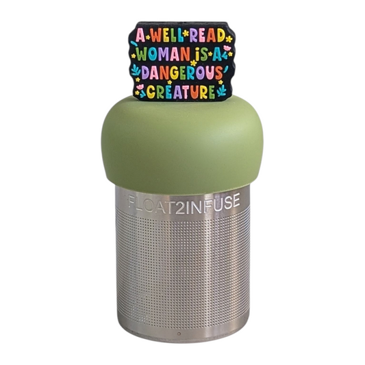 black rectangle with text "a well read woman is a dangerous creature" in rainbow colors tea infuser  for loose leaf tea with fine mesh stainless steel tea strainer that reads FLOAT2INFUSE on a green base with white background