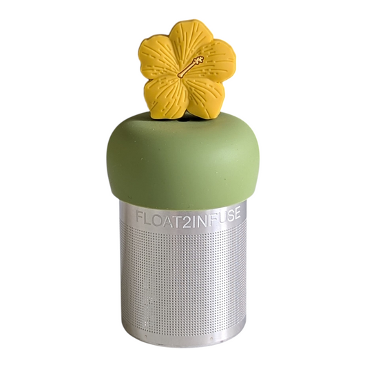 yellow hibiscus flower tea infuser for loose leaf tea with a fine mesh stainless steel tea strainer that reads FLOAT2INFUSE on a green base with a white background