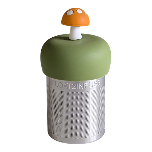 yellow mushroom tea infuser for loose leaf tea with a fine mesh stainless steel tea strainer that reads FLOAT2INFUSE on a green base with a white background